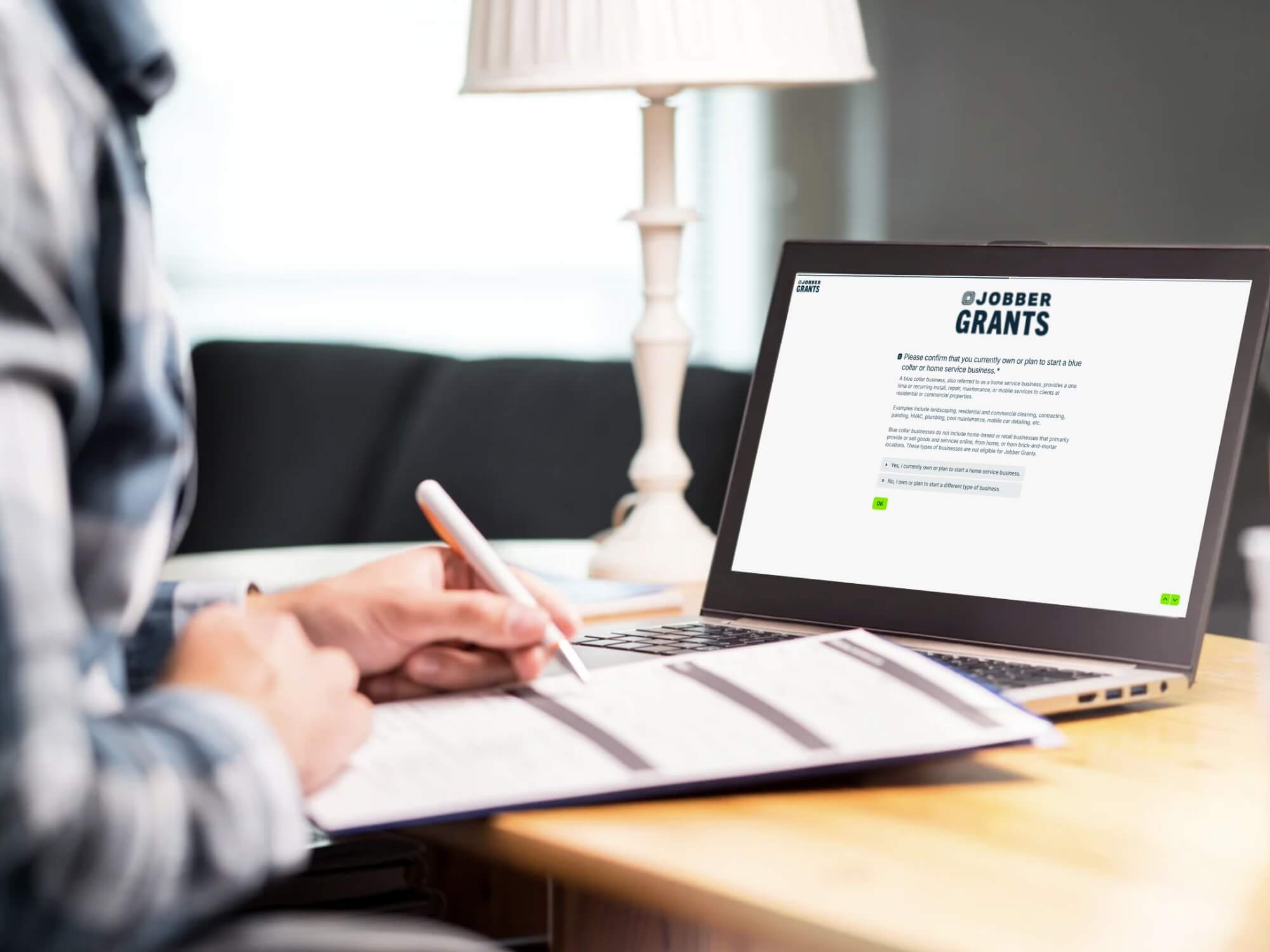 contractor completing Jobber Grants 2026 application online