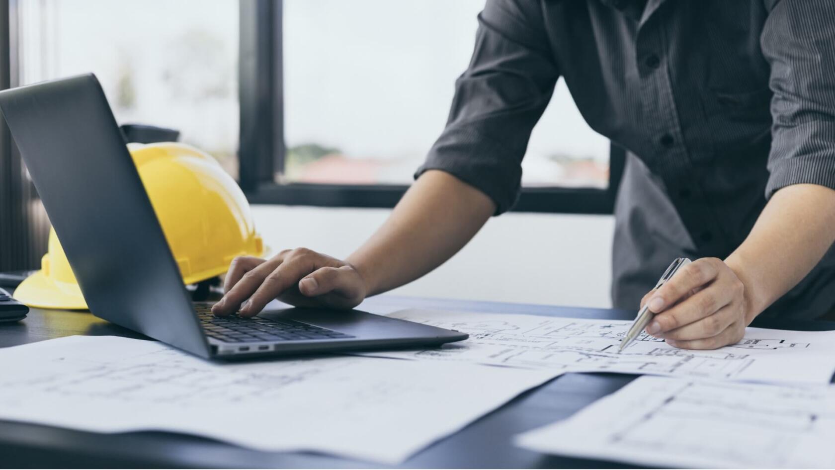 Small service business contractor reviewing Jobber Grants 2026 application