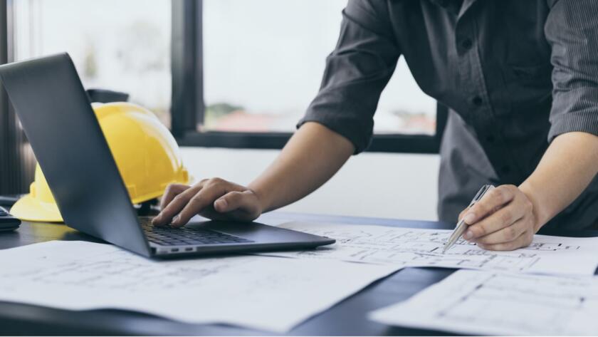 Small service business contractor reviewing Jobber Grants 2026 application