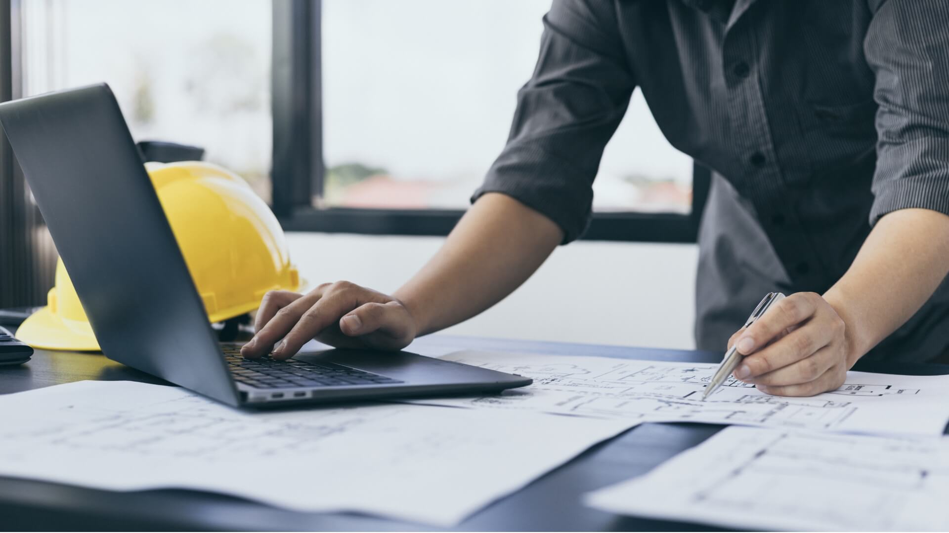 Small service business contractor reviewing Jobber Grants 2026 application